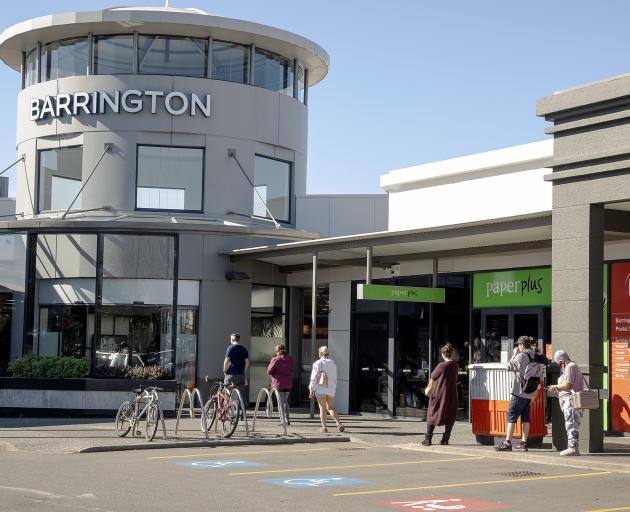 Shoppers queue up at at Barrington mall. Photo: Geoff Sloan