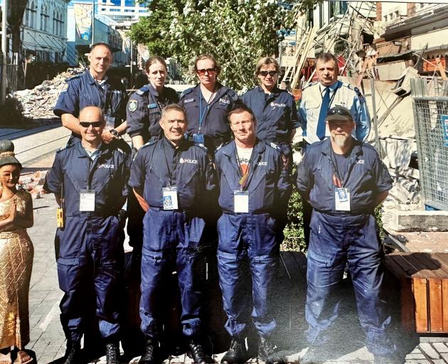 Senior Constable Garry Bombay (right, front) with other Search and Rescue members in the...