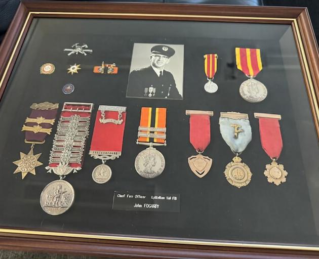 John Fogarty received a Queen's Service Medal in 1975. Other medals were awarded for his five...