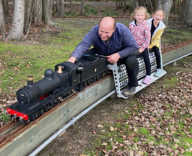 Alex Hunter takes his children Alice, 7, and Sarah, 5, for a ride on the Dukedog locomotive at...