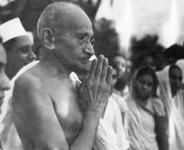 Mahatma Gandhi (1869-1948) greets followers at Juhu Beach, Mumbai, in May 1944. Photo: Getty Images