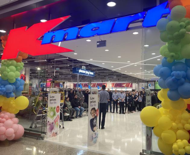 Staff are given a pep talk ahead the opening of the new South Dunedin Kmart store this morning....