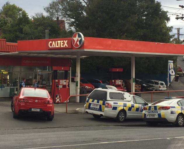 The man was found at the nearby Caltex service station. Photo: Gregor Richardson