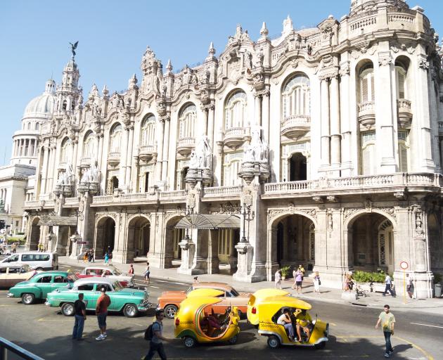 The Hotel Inglaterra, Havana’s famous historic hotel, located near the National Theatre and the Capitol. Special taxis are available outside to take tourists through the narrow alleys of Old Havana.PHOTO: GETTY IMAGES