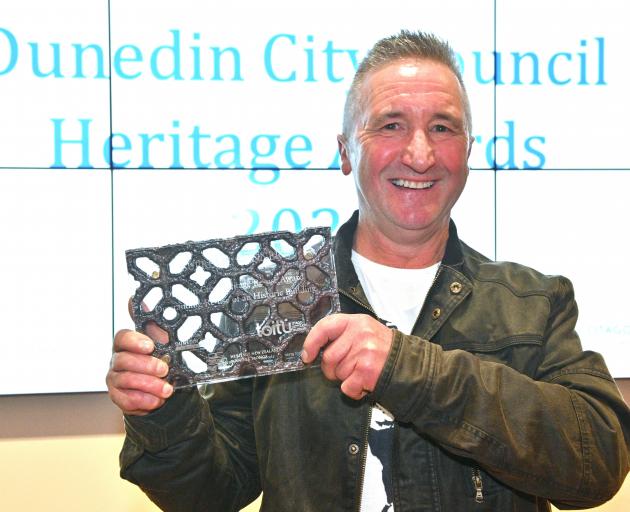 Lawrie Forbes receives the top award at the Dunedin Heritage Awards last night. PHOTO: LINDA...