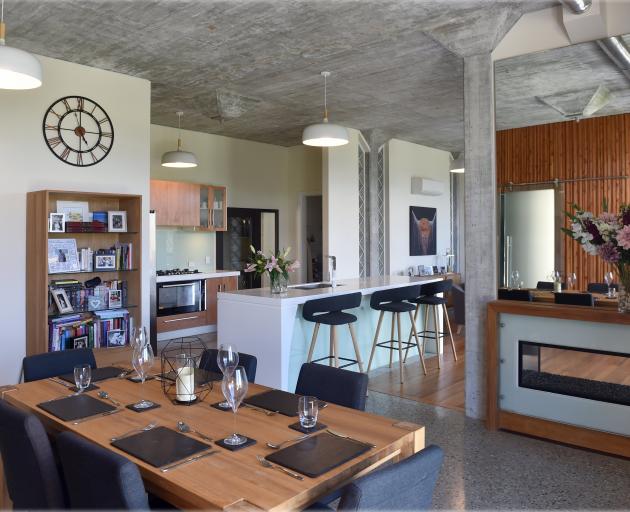 Mr Olsen made the feature wall in the lounge from off-set oregon slats and a friend built the...