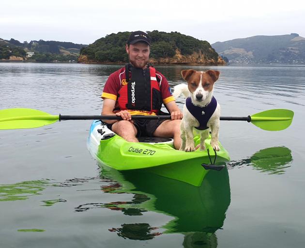 Runner up Lyndal Roe's photograph of Aidan Roe with Ted on Otago Harbour.