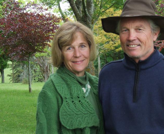 Marjorie and Mark Hay in front of a woodland area planted 24 years ago. Photos: Sally Rae