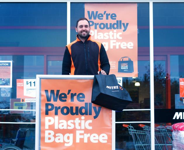 Matt Gallaher, marketing manager, Mitre 10 Wanaka, outside one of their stores which no longer...