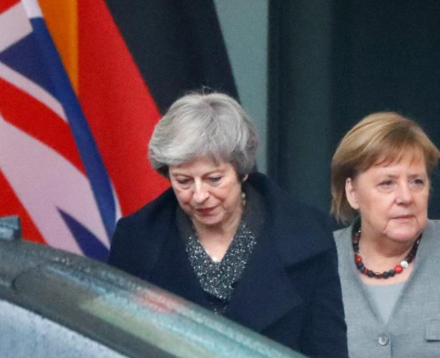 Theresa May (left) with Angela Merkel in Berlin. Photo: Reuters 