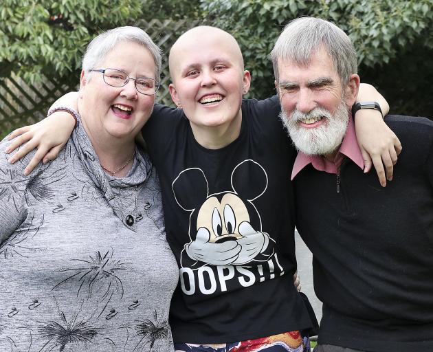 Megan with her mother Marilyn and father Richard. Photo: Martin Hunter