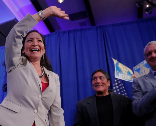Democratic Congressional candidate Deb Haaland takes the stage after winning her midterm election...