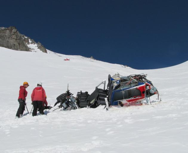 The helicopter somersaulted 700m down Mt Alta and split in two. Photo: supplied 