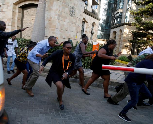 Terrified people flee the area. Photo: Reuters 