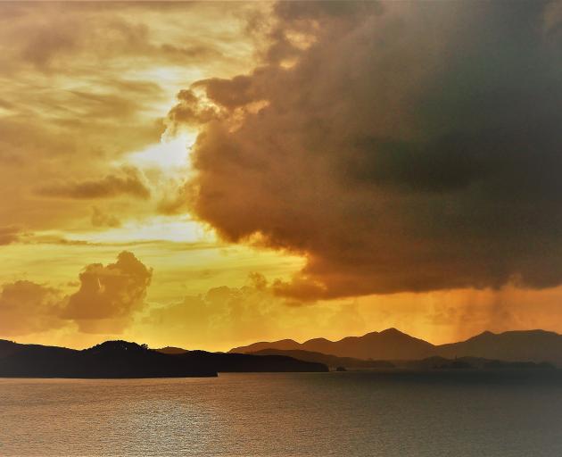 A golden sunrise over Moturua and Urupukapuka Islands and the Rawhiti headland. PHOTO:BRUCE MUNRO...