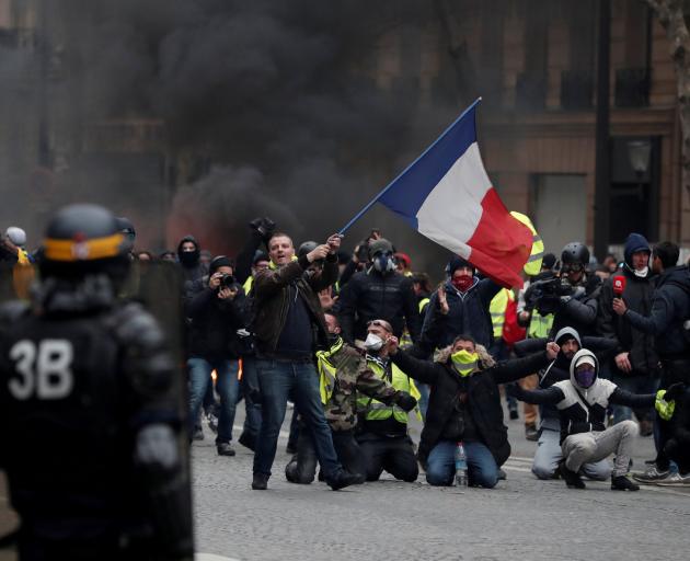 Authorities say 136,000 people had taken part in protests across France on Saturday, including 10...