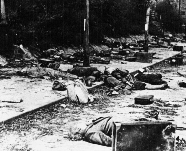 Dead German civilians after  a bombing raid. New Zealand squadrons  nearly always flew with...