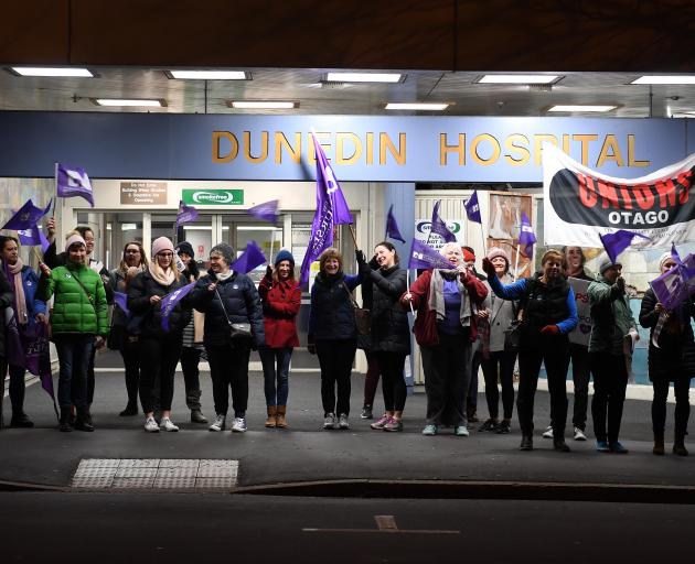 Nurses picket the front entrance of Dunedin Hospital this morning as their 24-hour strike started...