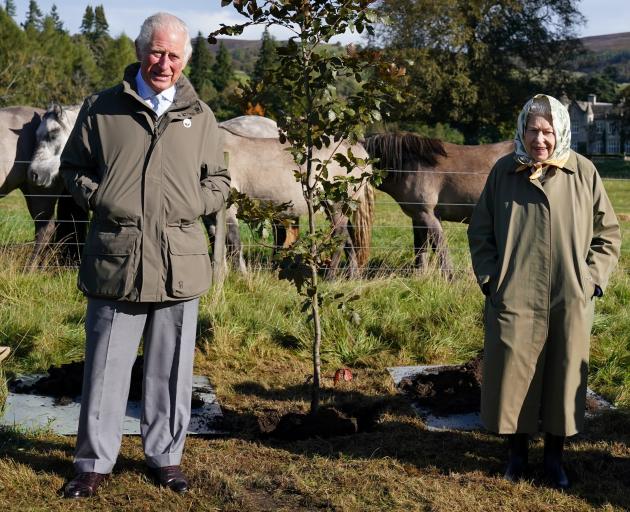 The Queen and Prince Charles mark the start of the official planting season for her Green Canopy...