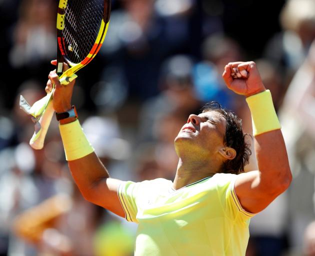 Rafael Nadal celebrates his straight-sets win over Roger Federer on Friday. Photo: Reuters 
