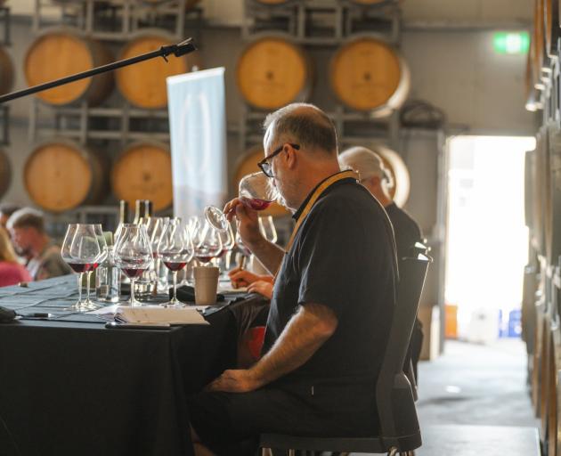 Panelist Paul Pujol of Prophet’s Rock tastes a wine at Roam Central. PHOTOS: SUPPLIED