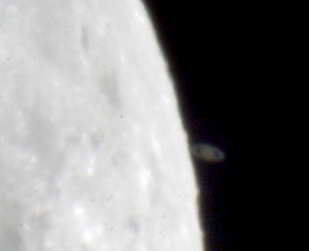 The occulation of Saturn by the moon happened about 12.47am today. Photo: Ian Griffin