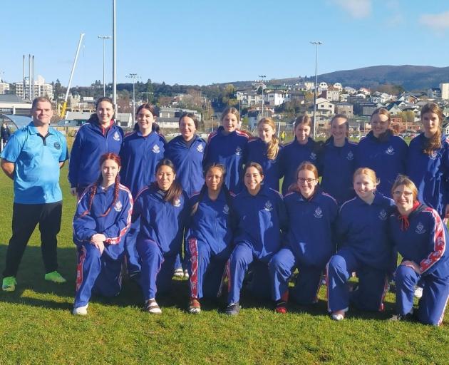 Rob Bray with his Queen's football team.