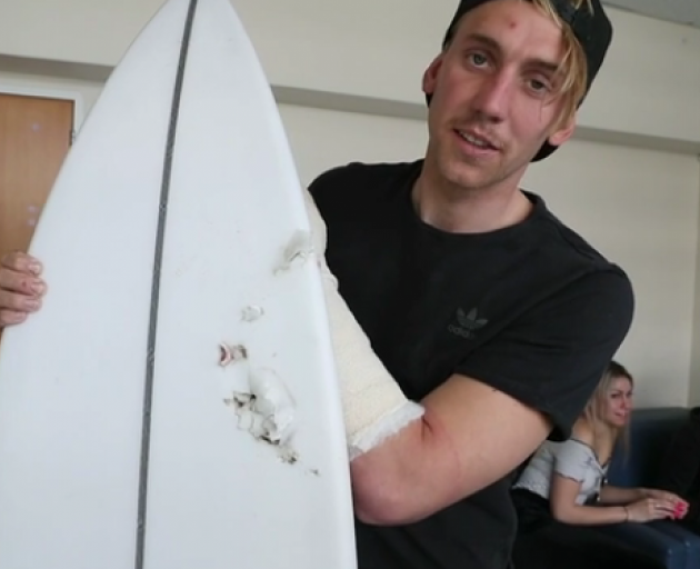 Northland surfer Andrew Brough had a lucky escape. Image: NZ Herald 