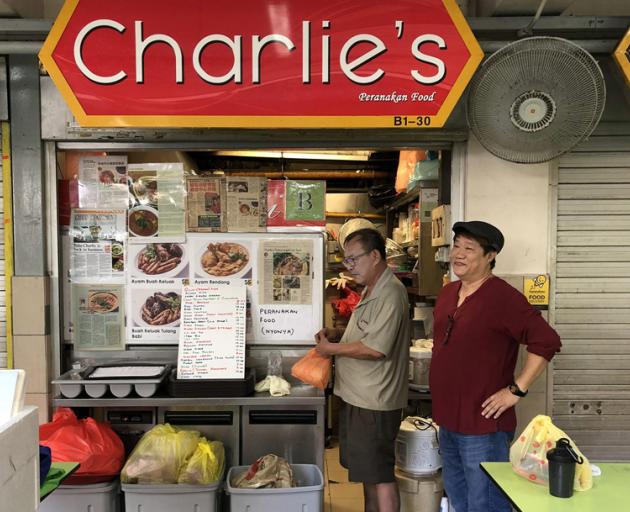 Charlie Tan is one of only a handful of hawkers in Singapore cooking Peranakan food, a cuisine...