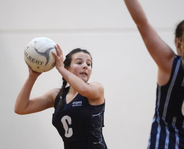 Otago Girls' High School centre Caitlin Thomson prepares to pass the ball. Photos: ODT files