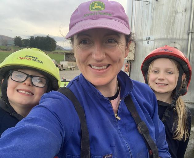 Clinton dairy farmer Madeline Anderson and her two children Beau(7) and Florence (8) take a break...