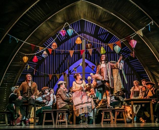 Stephen Chambers (standing on stool) in Landestheater Detmold's production of Zar & Zimmermann