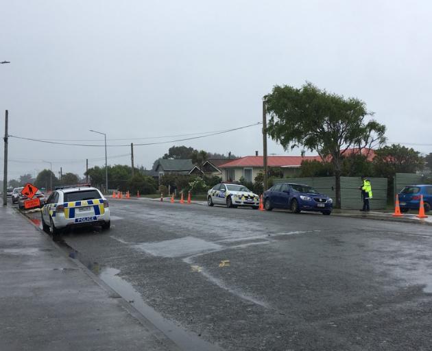 Police remained at the scene on Sunday. Photo: Laura Smith