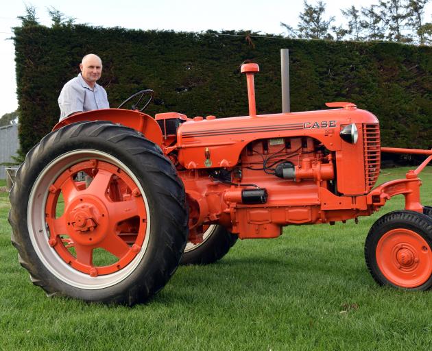 Blair Smollett drives his grandfather’s first tractor, a 1943 Case DC 3. PHOTO: SHAWN MCAVINUE