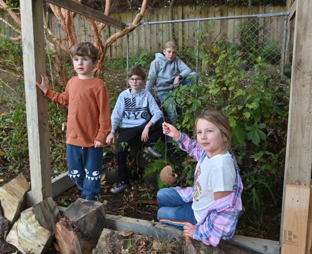 Inside St Leonard's Primary School's new butterfly enclosure are (from left) Cooper Sykes (5),...