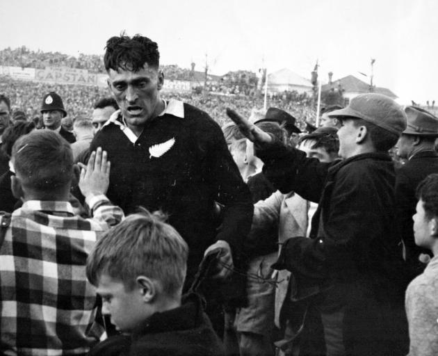 All Black Stan "Tiny" Hill walks off Eden Park after their test against South Africa in 1956....