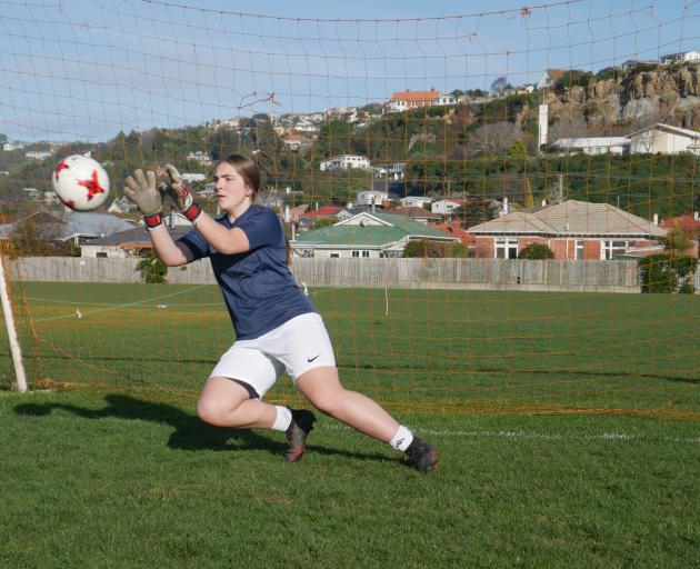 Lauren Paterson prevents a goal  during practice  at Tonga Park on Tuesday.  PHOTO: JESSICA...