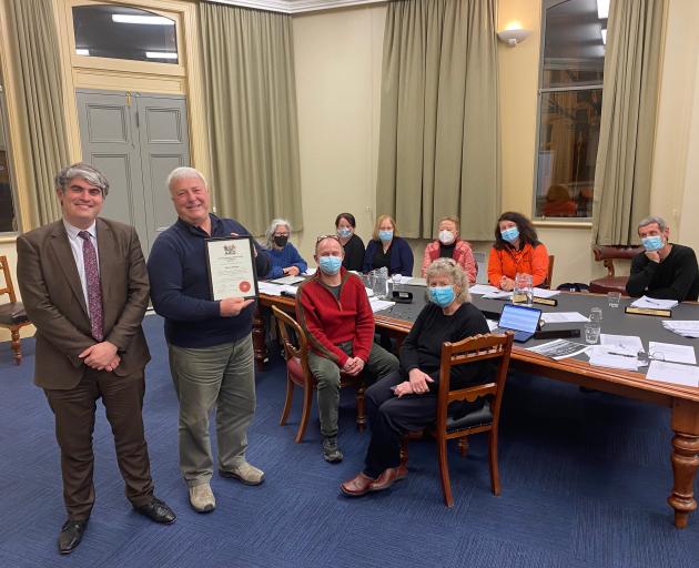 Dunedin Mayor Aaron Hawkins stands with long-serving West Harbour Community Board member Trevor...