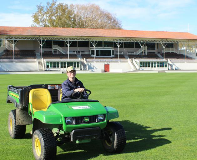 Angus Duffield works to keep University Oval looking its best. PHOTO: ELLA STOKES