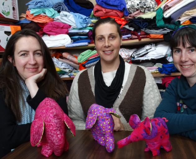 Using waste fabric to create 4000 soft toy elephants is an exciting new project for (from left)...