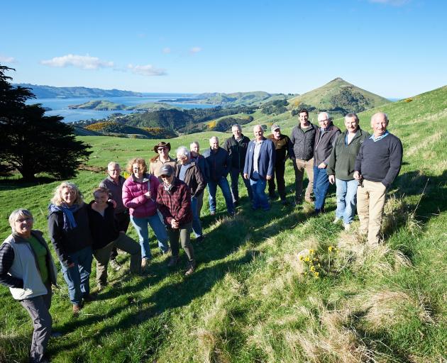 Members of Otago Peninsula Biodiversity Group  gather atop the peninsula recently. PHOTO: CRAIG MCKENZIE