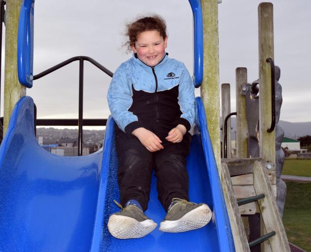 Abigail Dustow returns to a slide in Marlow Park in St Kilda on Monday. It is where she injured...