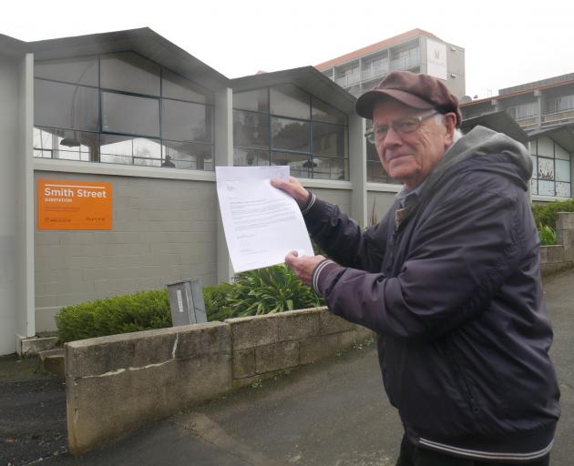 York Pl resident Roy Kenny with the letter he received from Aurora Energy Ltd’s lawyer in 2017...