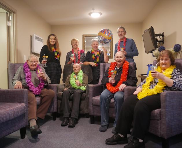 Glendale Retirement Home staff (back from left) caregiver Casey Brown, caregiver Nadine
...