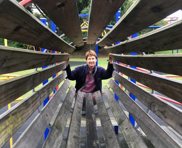 Age Concern Otago falls prevention co-ordinator Margaret Dando inspects play equipment in the...