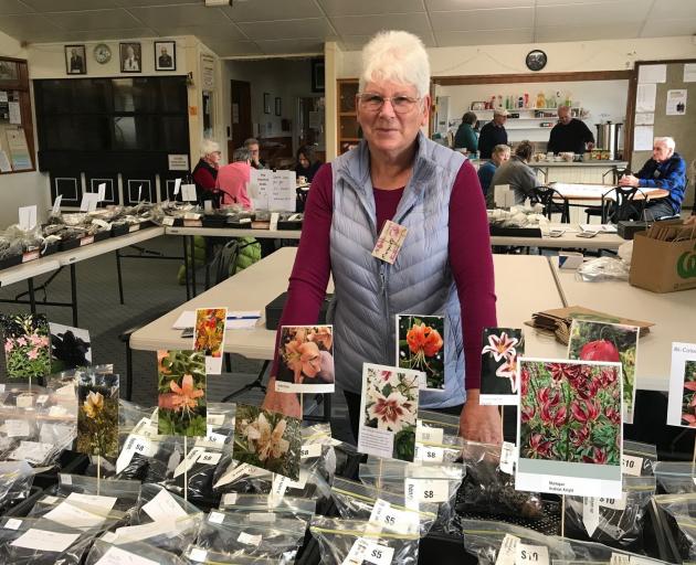 Otago Lily Society secretary Margaret Dodds with some of the hundreds of bulbs the society sold...