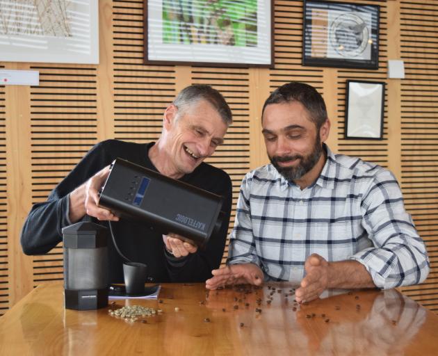 Kaffelogic founder Chris Hilder (left) and Horopito Cafe manager Simon Kitchingman pour roasted...