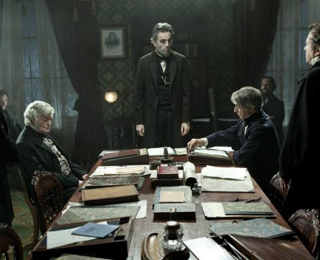 Abraham Lincoln (Daniel Day-Lewis) meets with his cabinet in a scene from Lincoln.