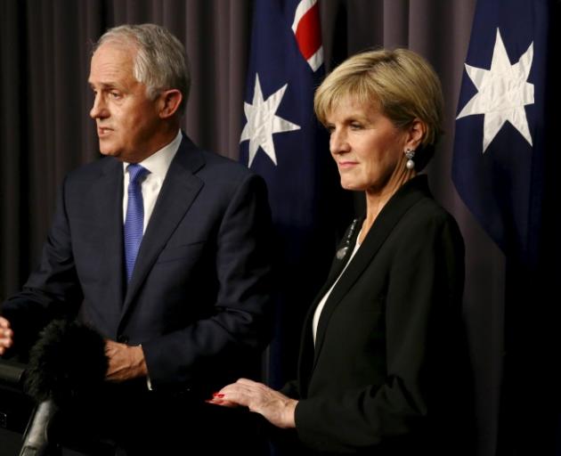 Malcolm Turnbull (L) speaks to the media alongside Australian Foreign Minister Julie Bishop...