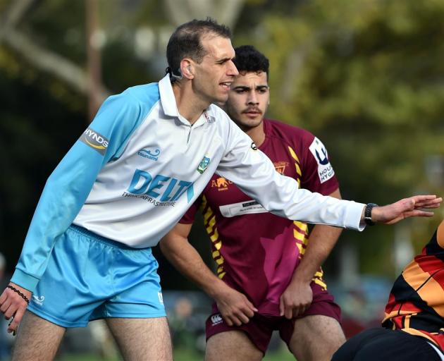 Referee Jono Bredin controls a scrum in the premier club match between Alhambra-Union and Zingari-Richmond in Dunedin on Saturday. In behind Bredin is Alhambra-Union halfback Legin Felix-Hotham. PHOTO: PETER MCINTOSH